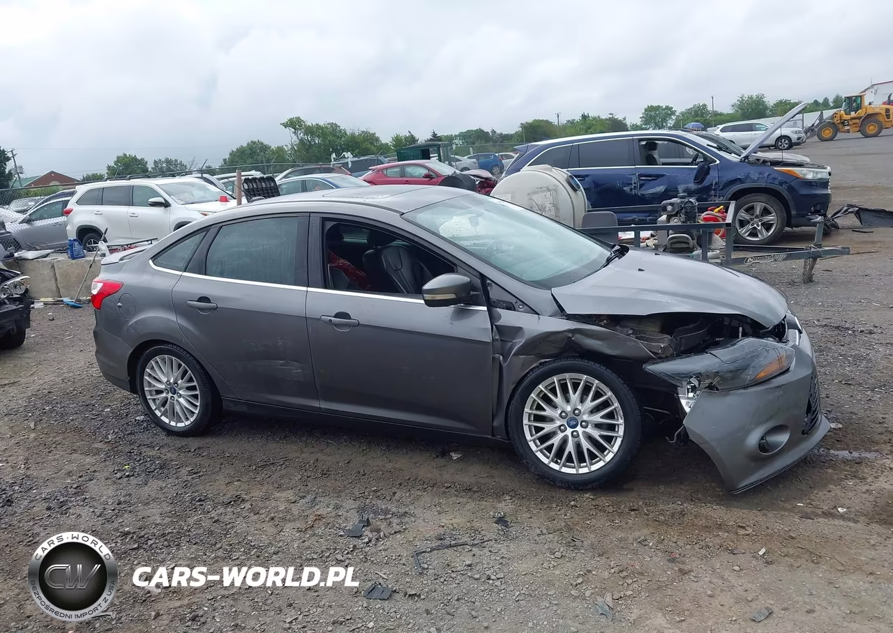 2013 Ford Focus Titanium VIN:1FADP3J27DL128972 - 13