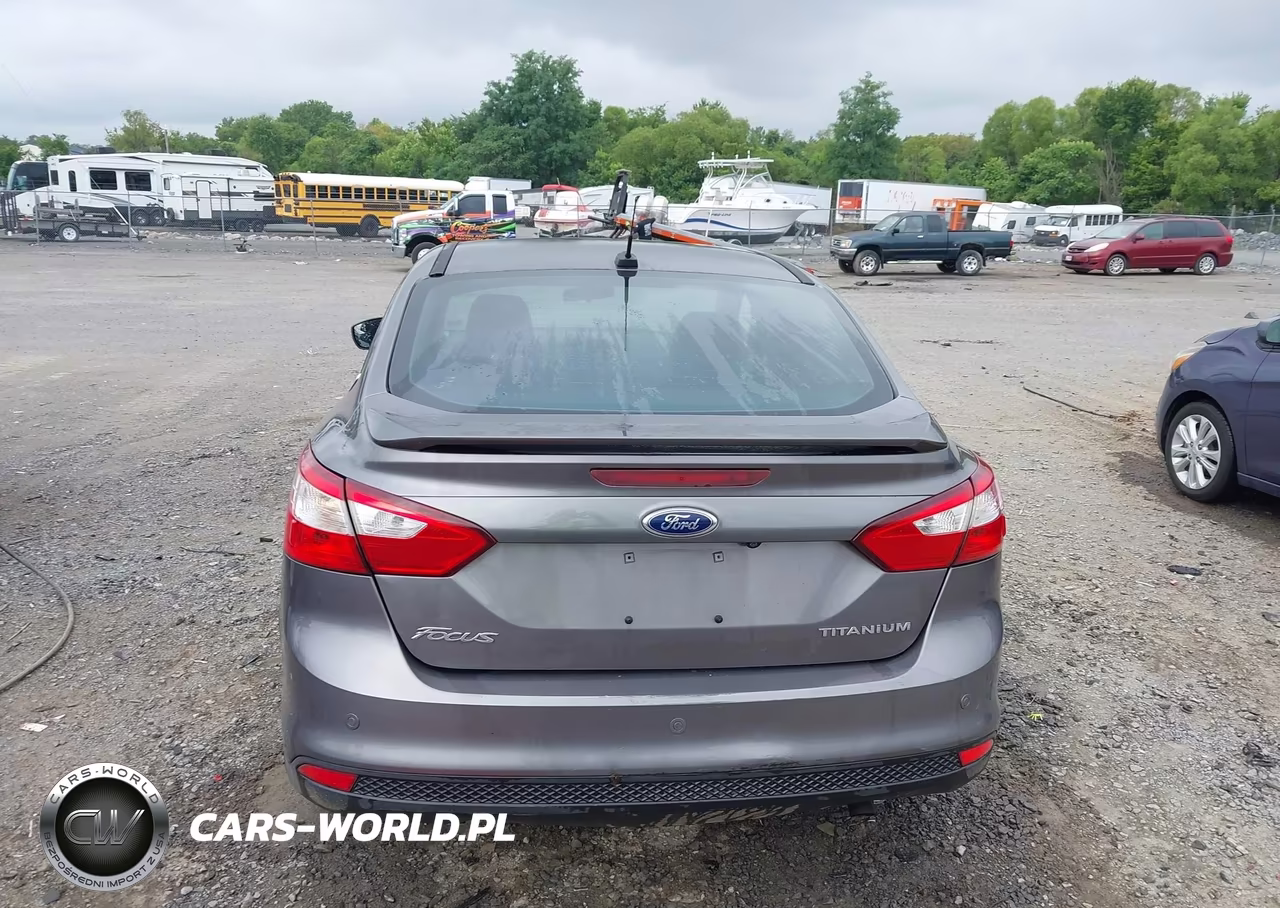 2013 Ford Focus Titanium VIN:1FADP3J27DL128972 - 16