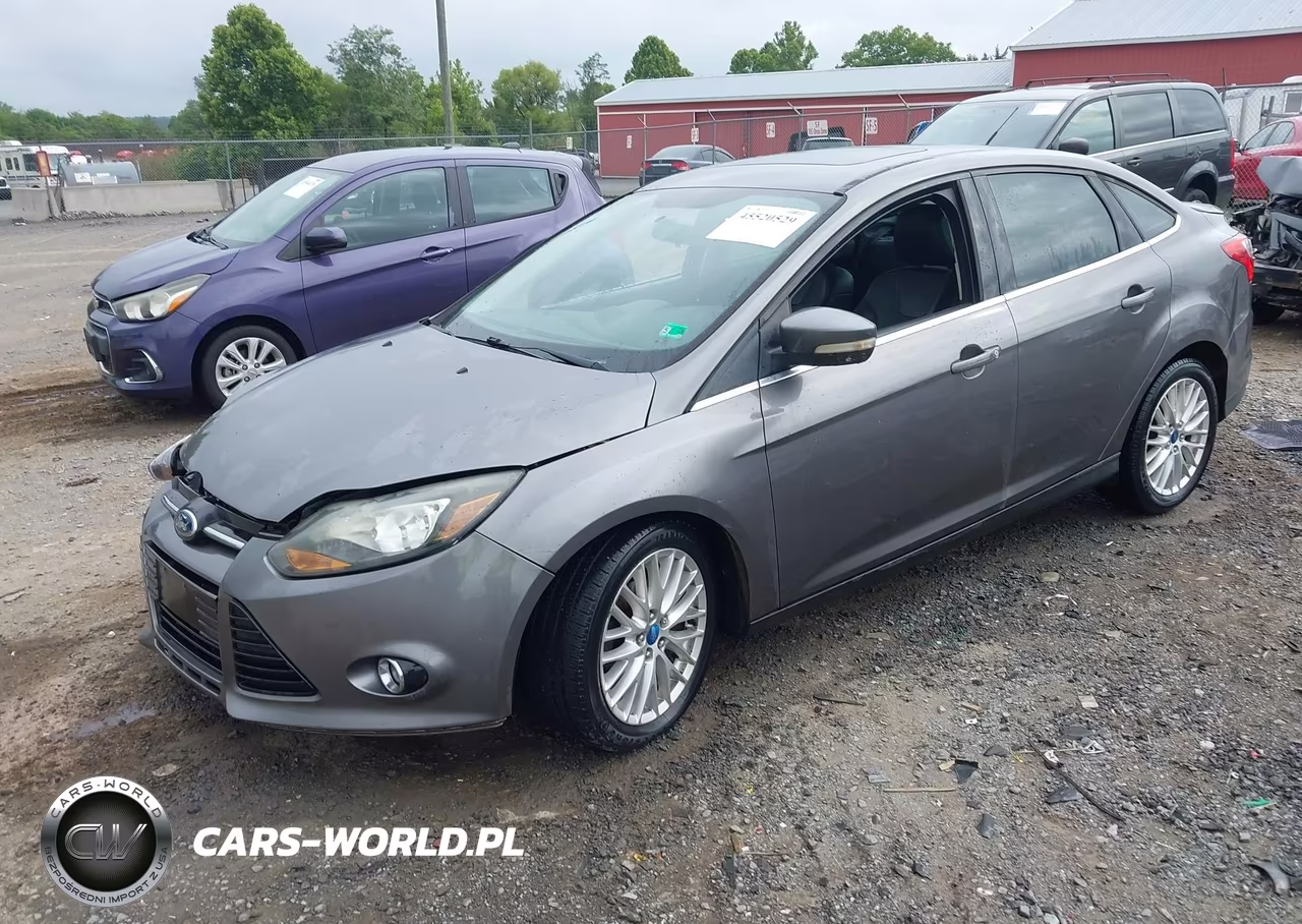 2013 Ford Focus Titanium VIN:1FADP3J27DL128972 - 2