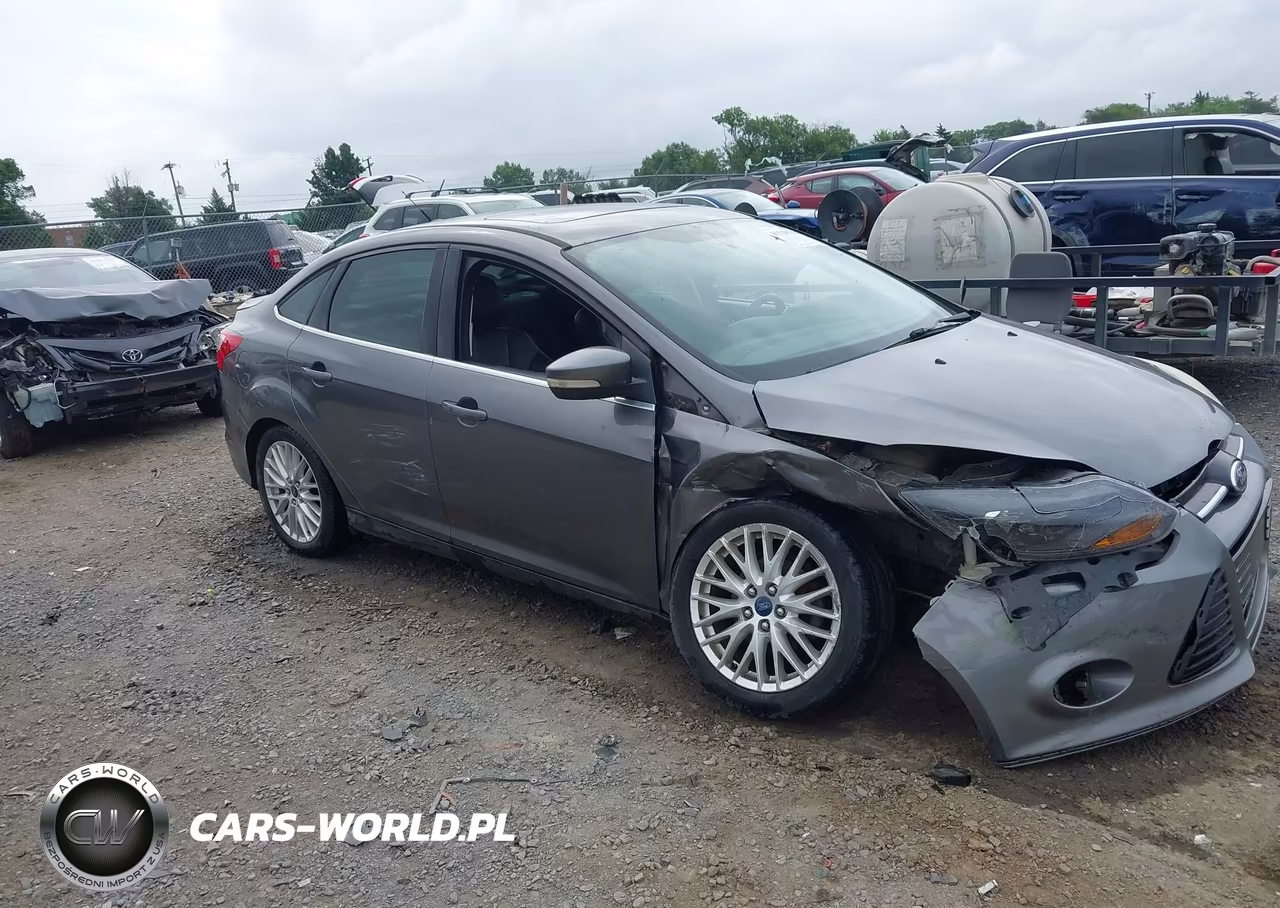 2013 Ford Focus Titanium VIN:1FADP3J27DL128972 - 6