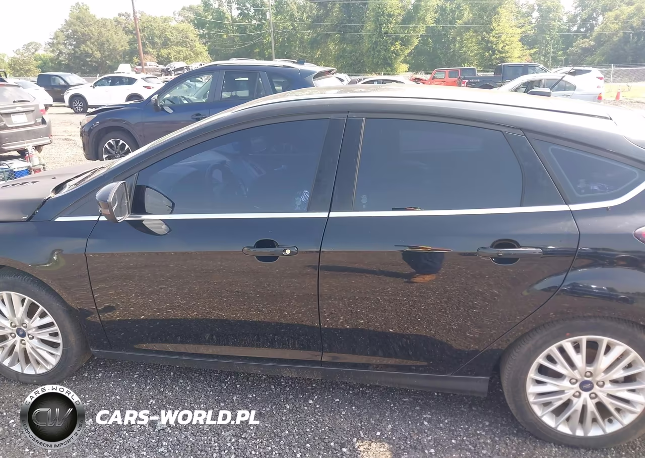 2017 Ford Focus Titanium VIN:1FADP3N25HL221229 - 14