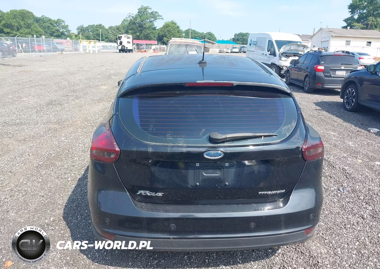 2017 Ford Focus Titanium VIN:1FADP3N25HL221229 - 16