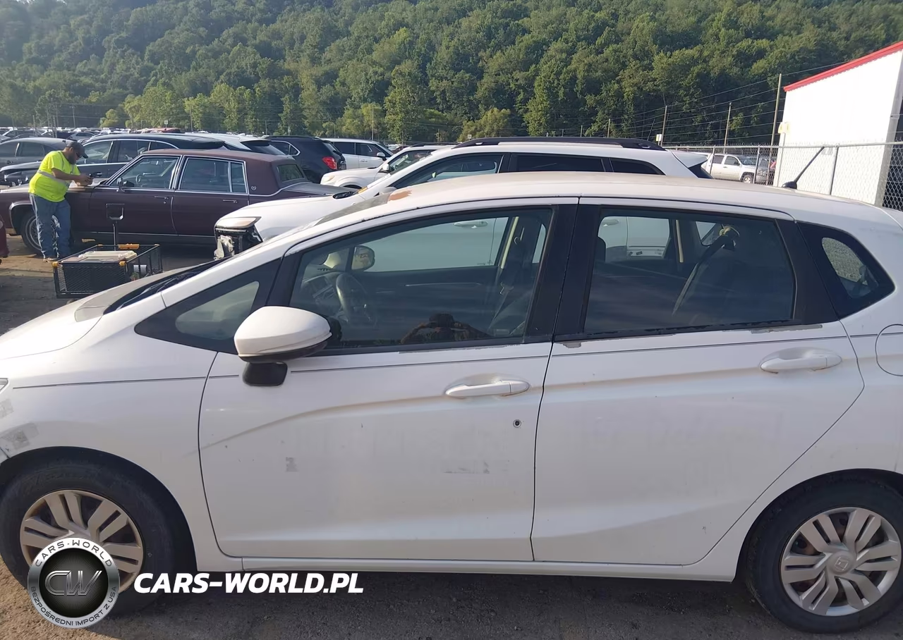 2015 Honda Fit Lx VIN:3HGGK5H51FM735387 - 14