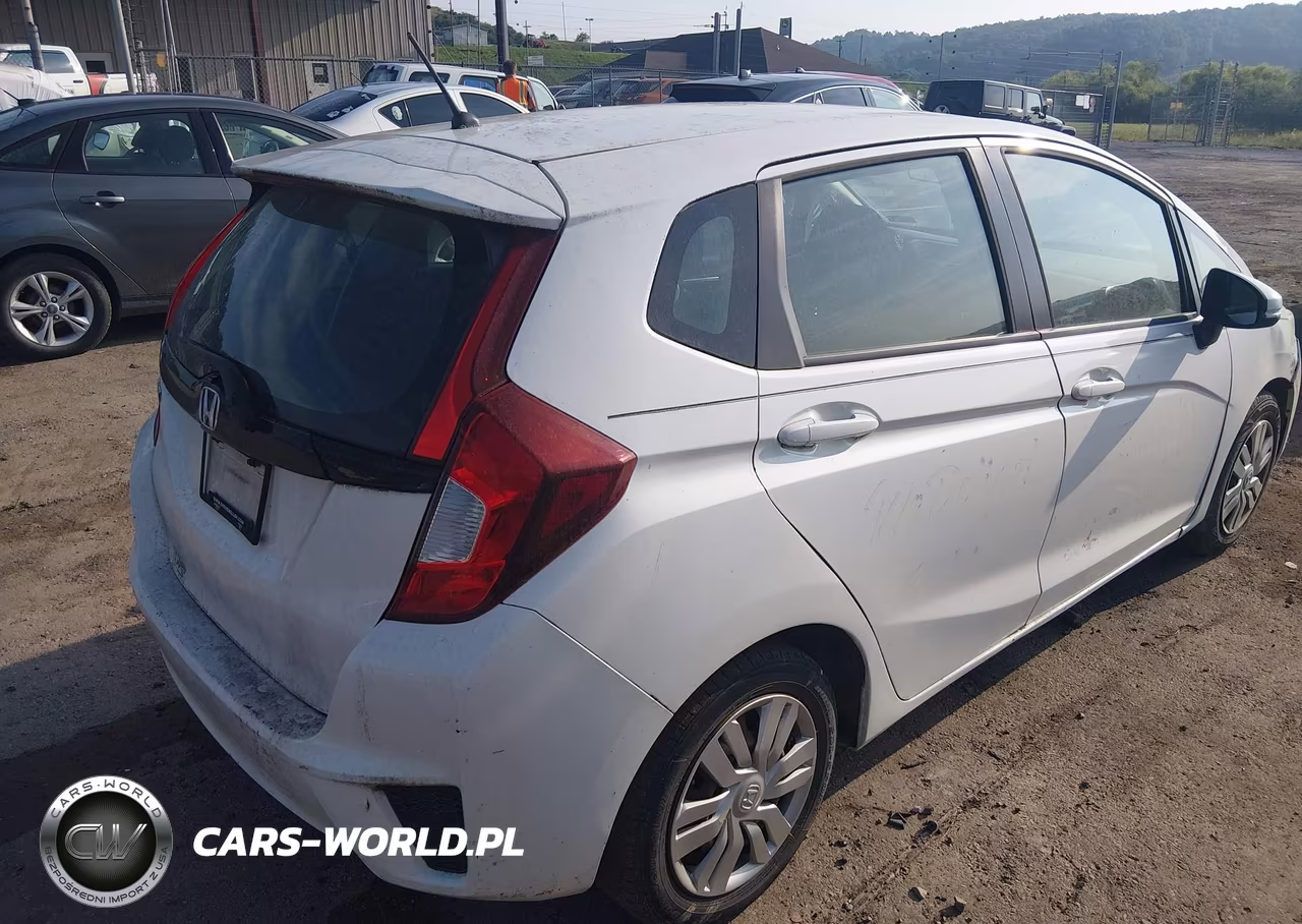 2015 Honda Fit Lx VIN:3HGGK5H51FM735387 - 4