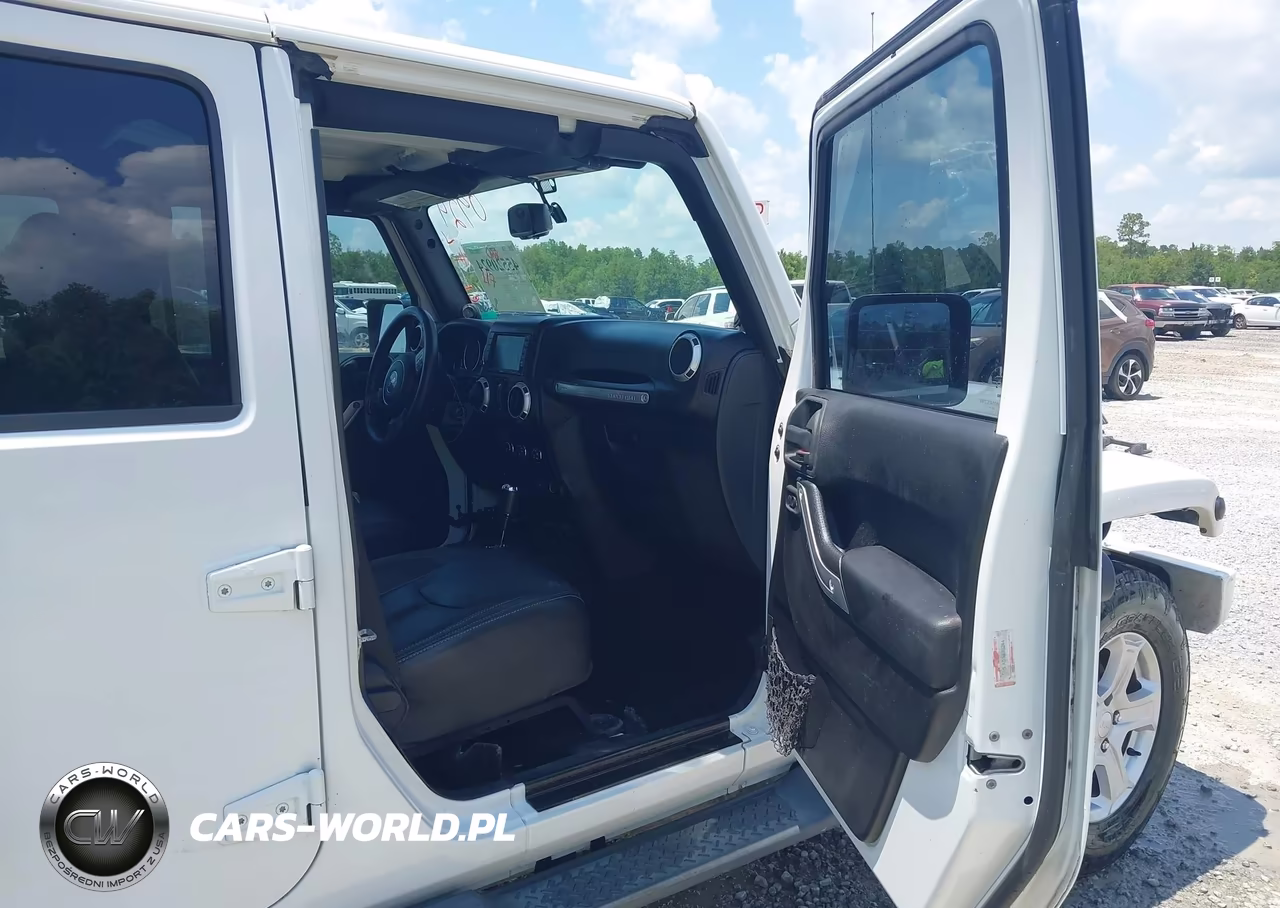 2014 Jeep Wrangler Unlimited Sahara VIN:1C4HJWEG2EL123801 - 5