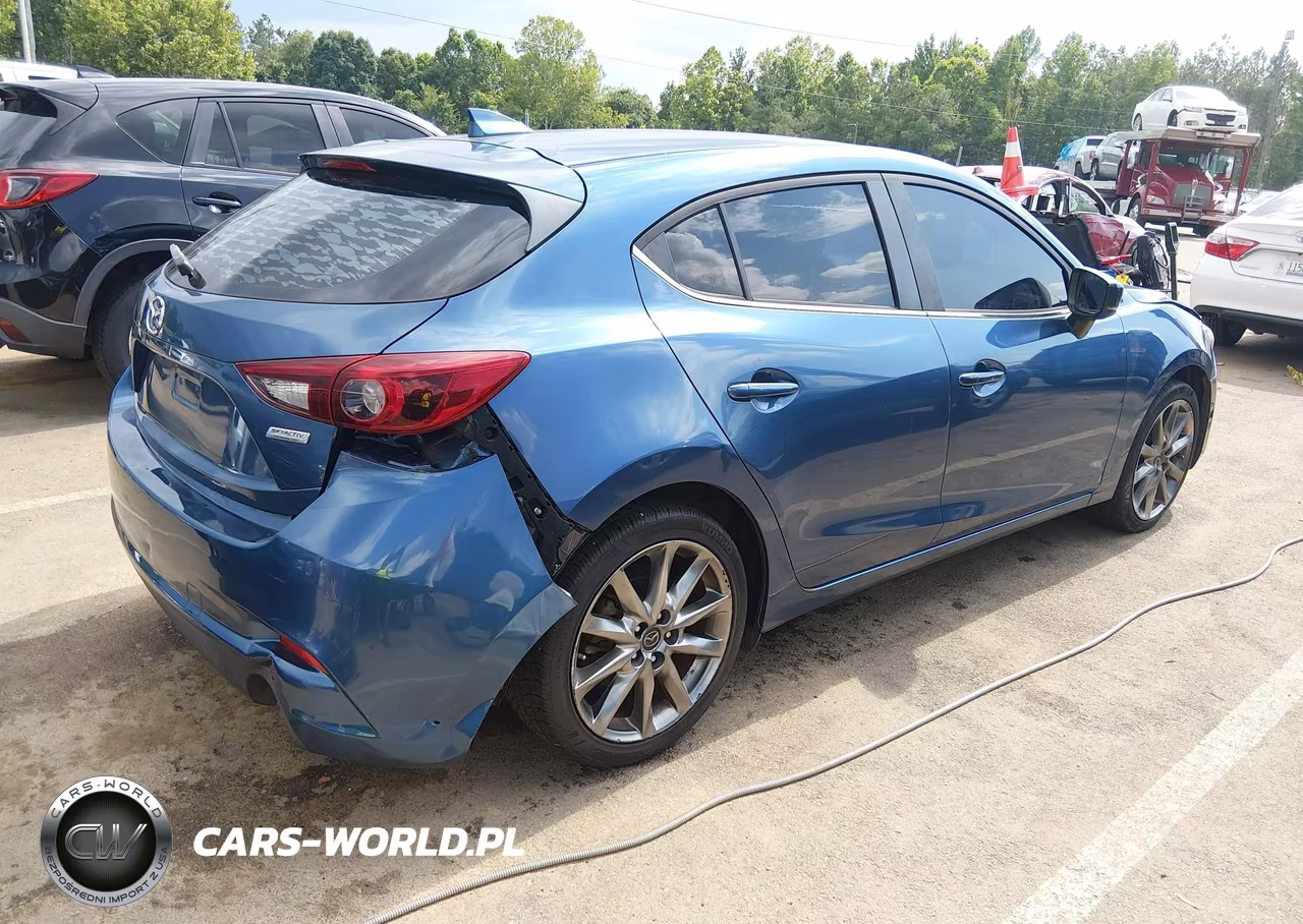 2018 Mazda Mazda3 Grand Touring VIN:3MZBN1M37JM160201 - 4