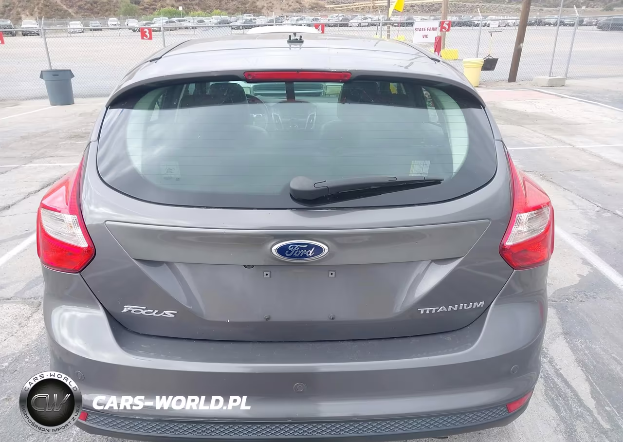 2013 Ford Focus Titanium VIN:1FADP3N26DL301536 - 16