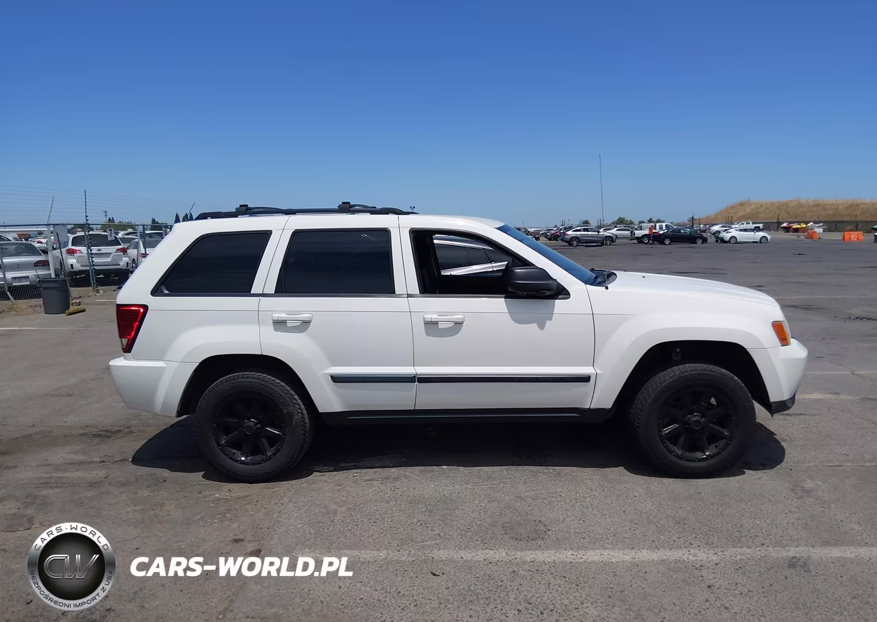 2009 Jeep Grand Cherokee Laredo VIN:1J8GR48K39C551271 - 13