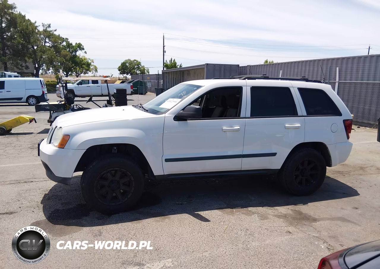 2009 Jeep Grand Cherokee Laredo VIN:1J8GR48K39C551271 - 14