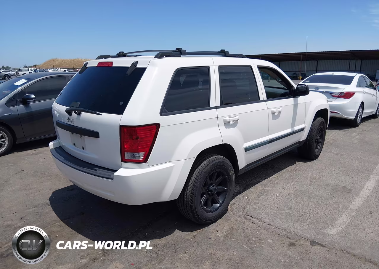 2009 Jeep Grand Cherokee Laredo VIN:1J8GR48K39C551271 - 4
