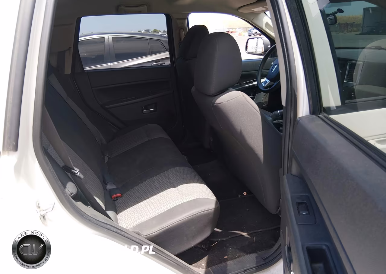 2009 Jeep Grand Cherokee Laredo VIN:1J8GR48K39C551271 - 8
