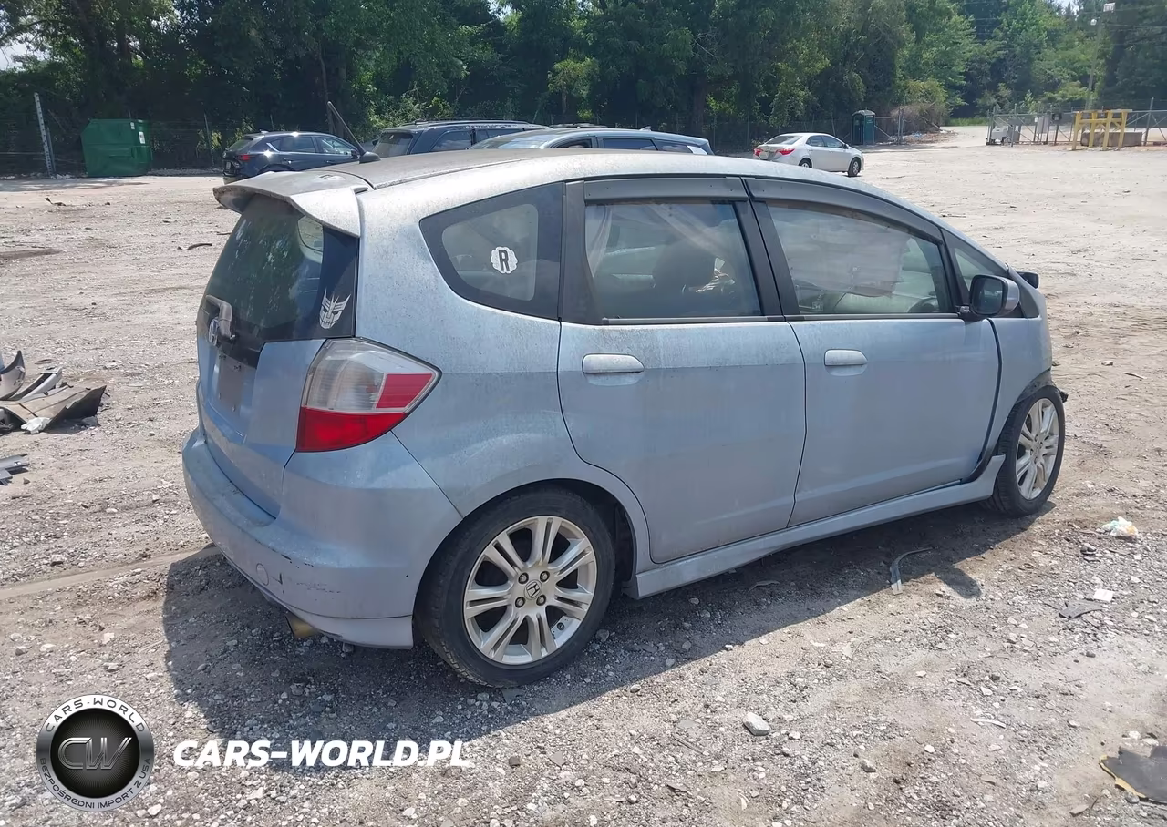 2009 Honda Fit Sport VIN:JHMGE87649S007560 - 4