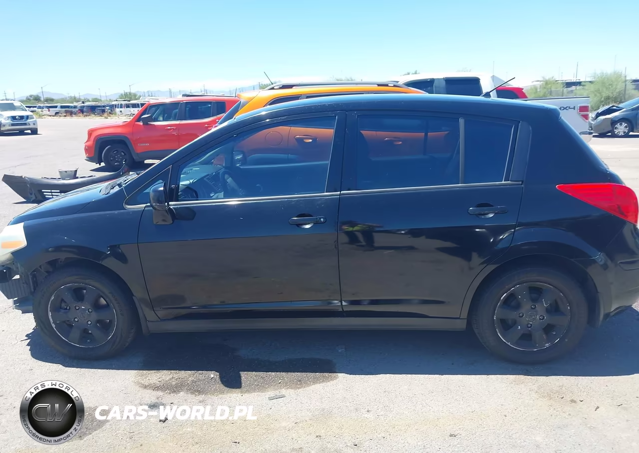 2009 Nissan Versa 1.8Sl VIN:3N1BC13E09L411804 - 15
