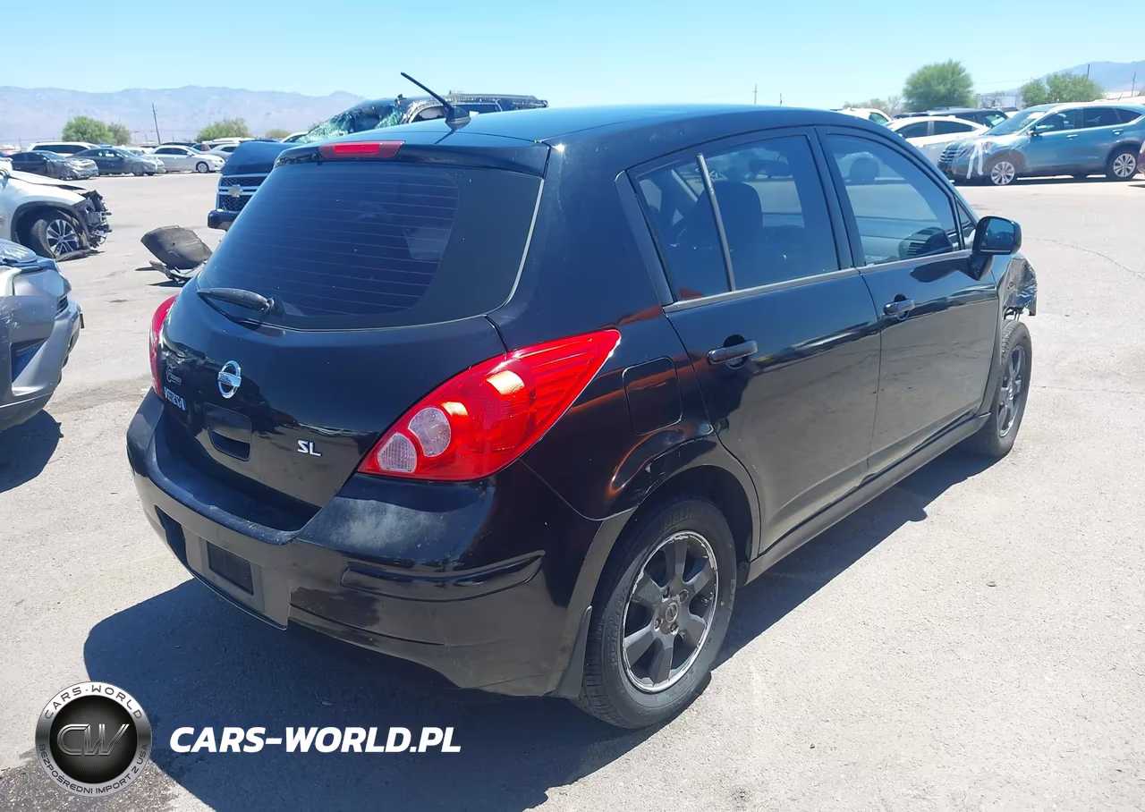 2009 Nissan Versa 1.8Sl VIN:3N1BC13E09L411804 - 4