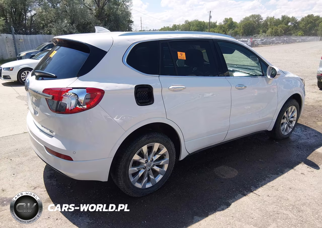 2018 Buick Envision Essence VIN:LRBFX2SAXJD009806 - 4