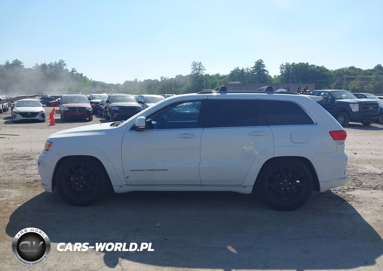 2015 Jeep Grand Cherokee Summit VIN:1C4RJFJT1FC759389 - 14
