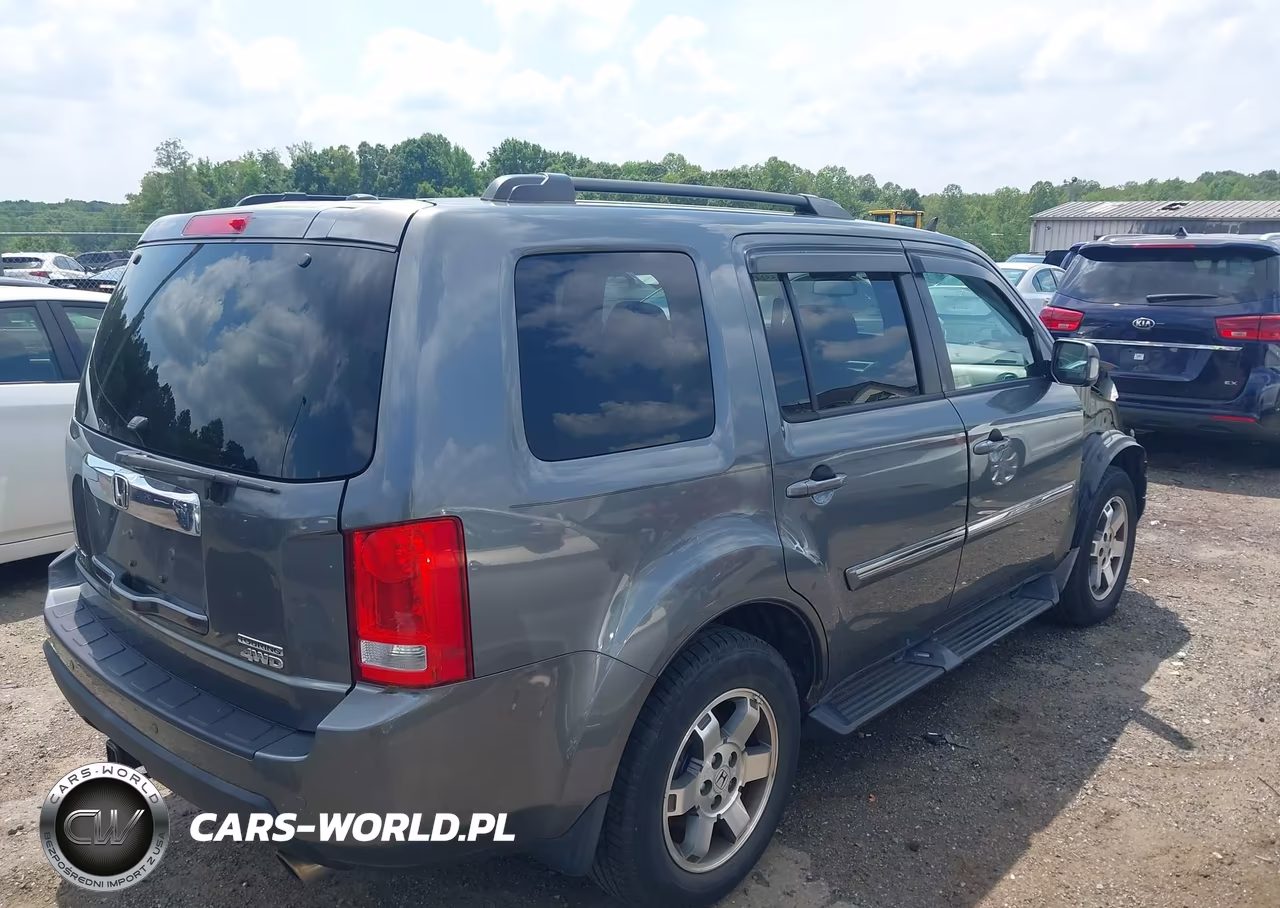 2011 Honda Pilot Touring VIN:5FNYF4H98BB025826 - 4