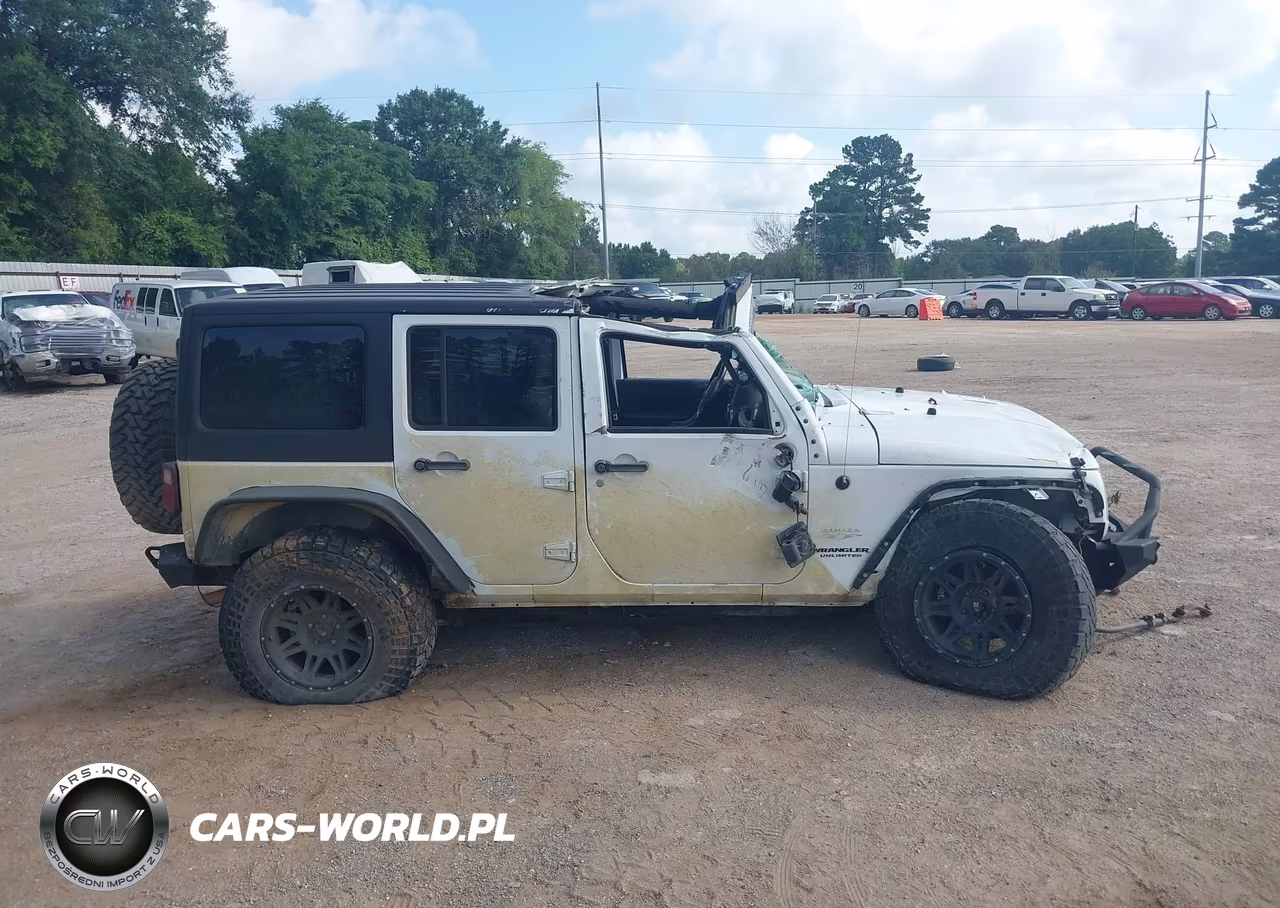 2015 Jeep Wrangler Unlimited Sahara VIN:1C4BJWEG7FL774610 - 13