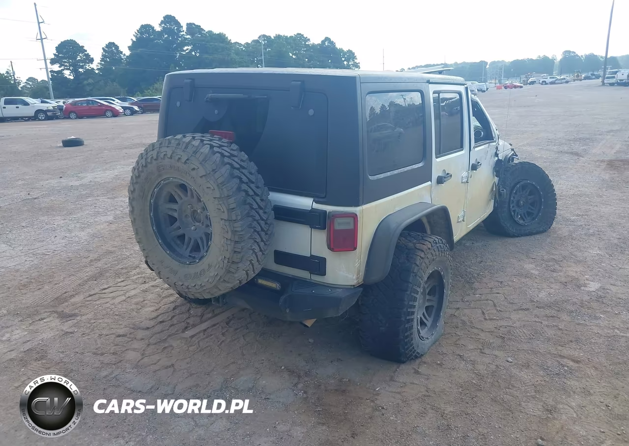 2015 Jeep Wrangler Unlimited Sahara VIN:1C4BJWEG7FL774610 - 4
