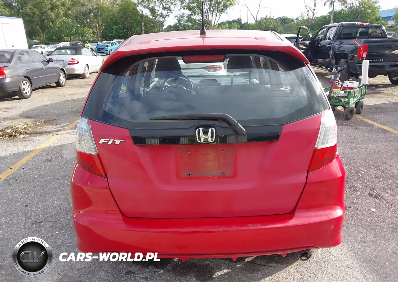 2009 Honda Fit Sport VIN:JHMGE88499S014369 - 16