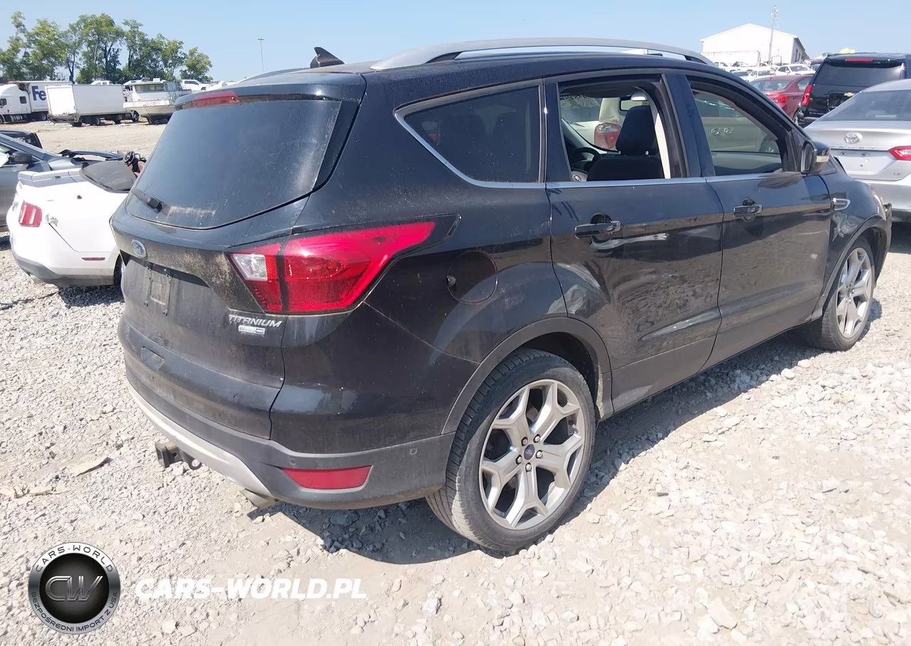 2019 Ford Escape Titanium VIN:1FMCU9J97KUB47149 - 4
