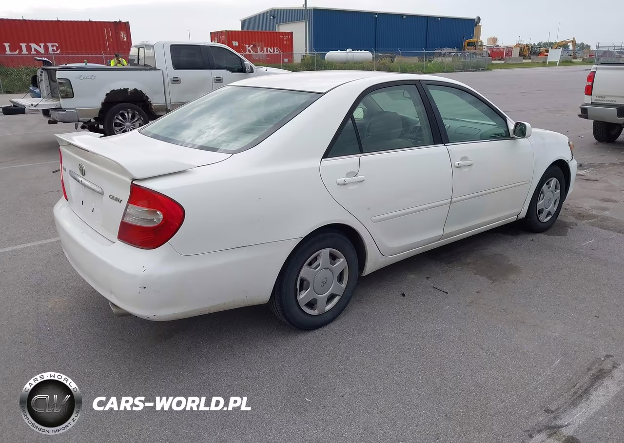 2004 Toyota Camry Le VIN:JTDBE32K640255543 - 4