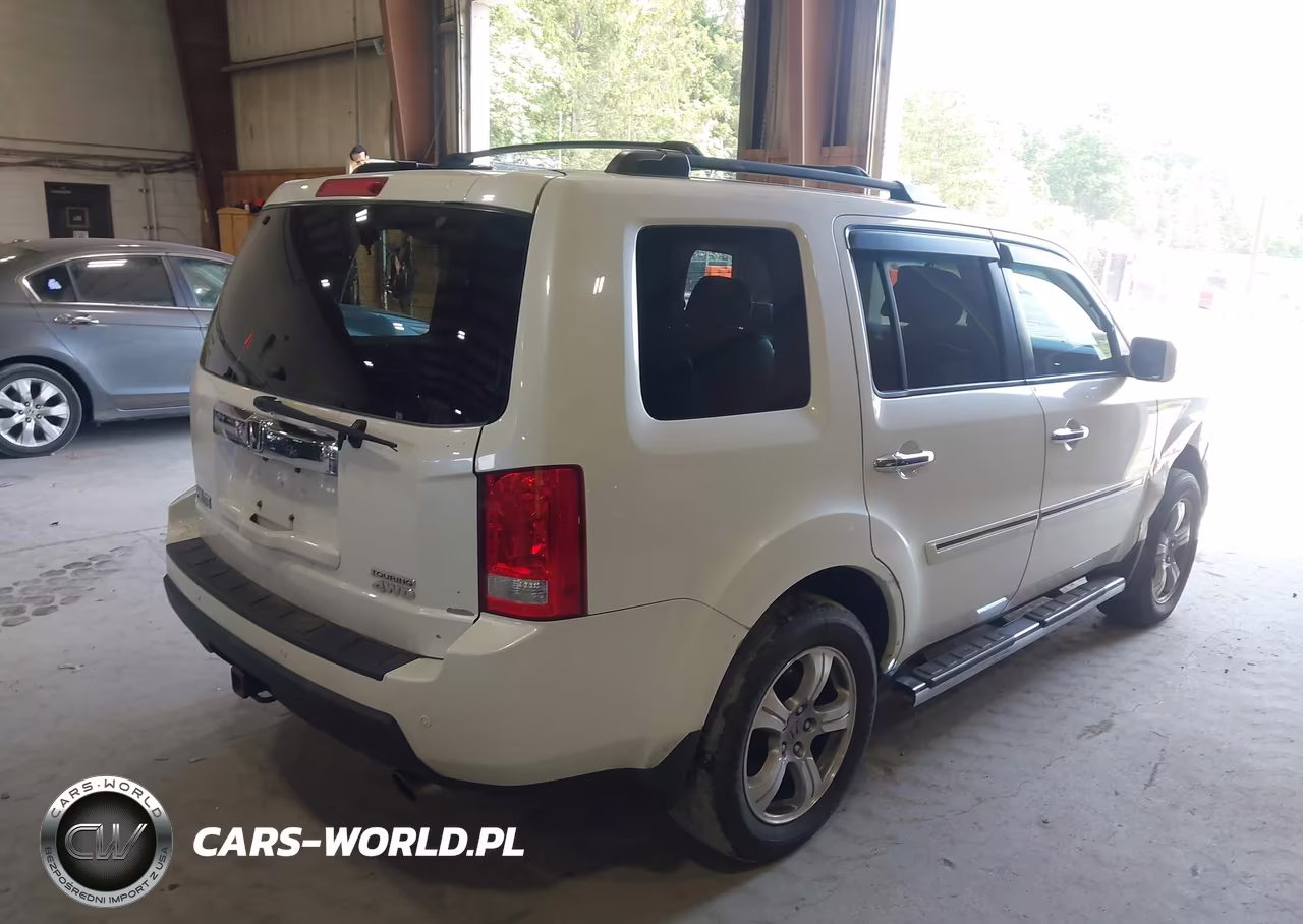 2011 Honda Pilot Touring VIN:5FNYF4H9XBB020885 - 4