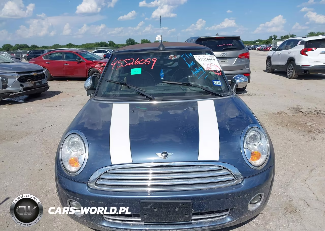2009 Mini Cooper VIN:WMWMR33579TU95046 - 12