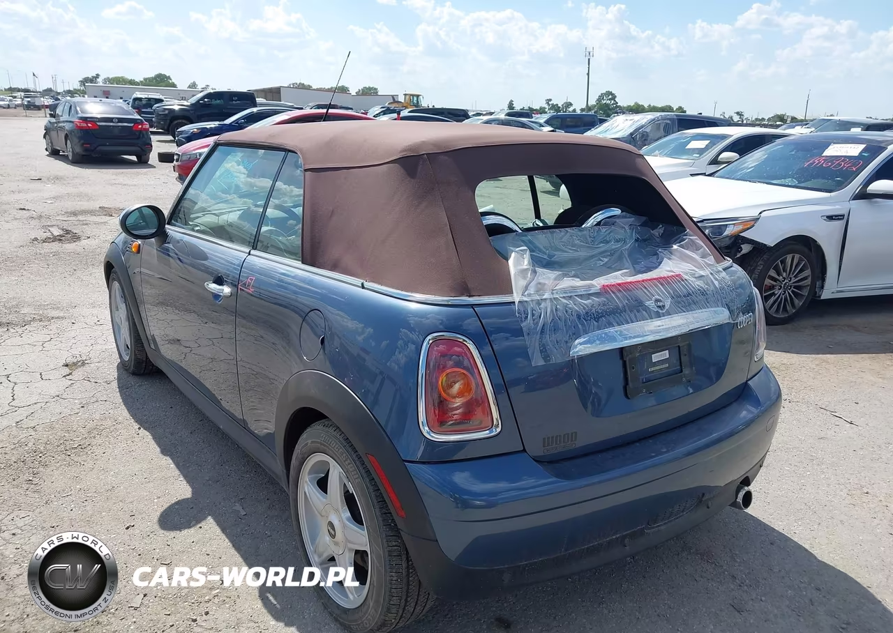 2009 Mini Cooper VIN:WMWMR33579TU95046 - 3