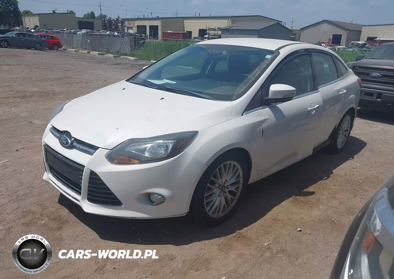 2014 Ford Focus Titanium VIN:1FADP3J22EL217799 - 2