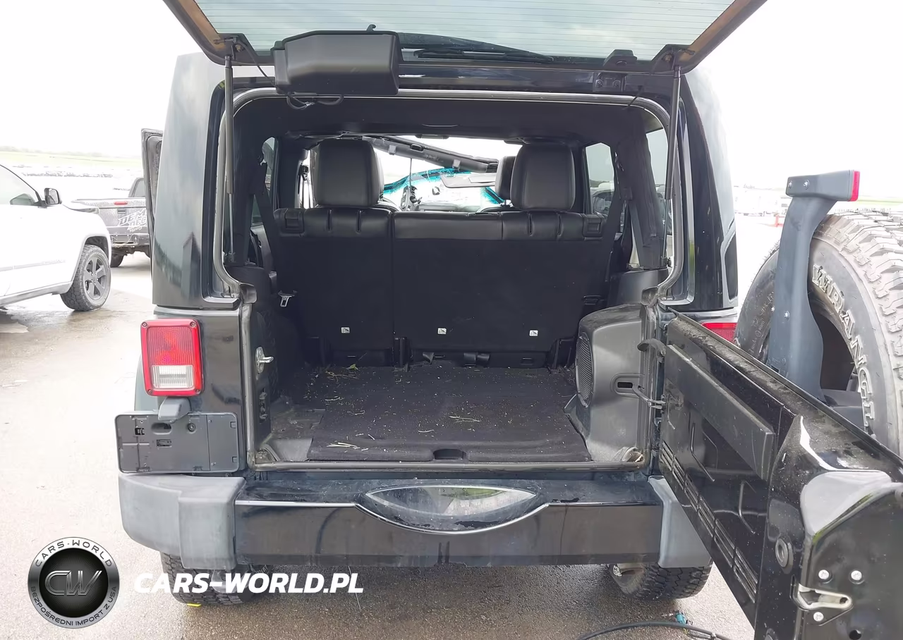 2014 Jeep Wrangler Unlimited Sahara VIN:1C4BJWEG6EL263324 - 13