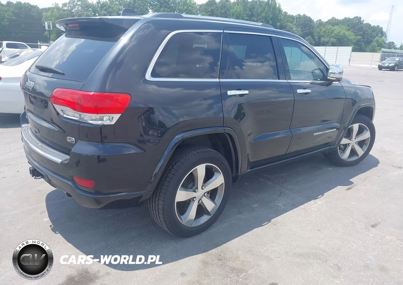 2015 Jeep Grand Cherokee Overland VIN:1C4RJECM4FC920267 - 4