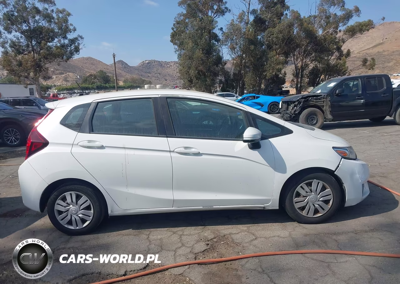 2015 Honda Fit Lx VIN:3HGGK5H52FM786588 - 13