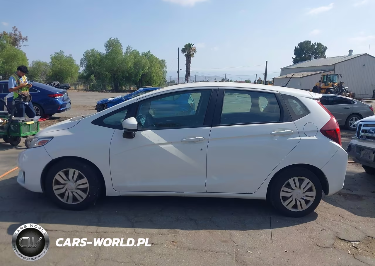 2015 Honda Fit Lx VIN:3HGGK5H52FM786588 - 14