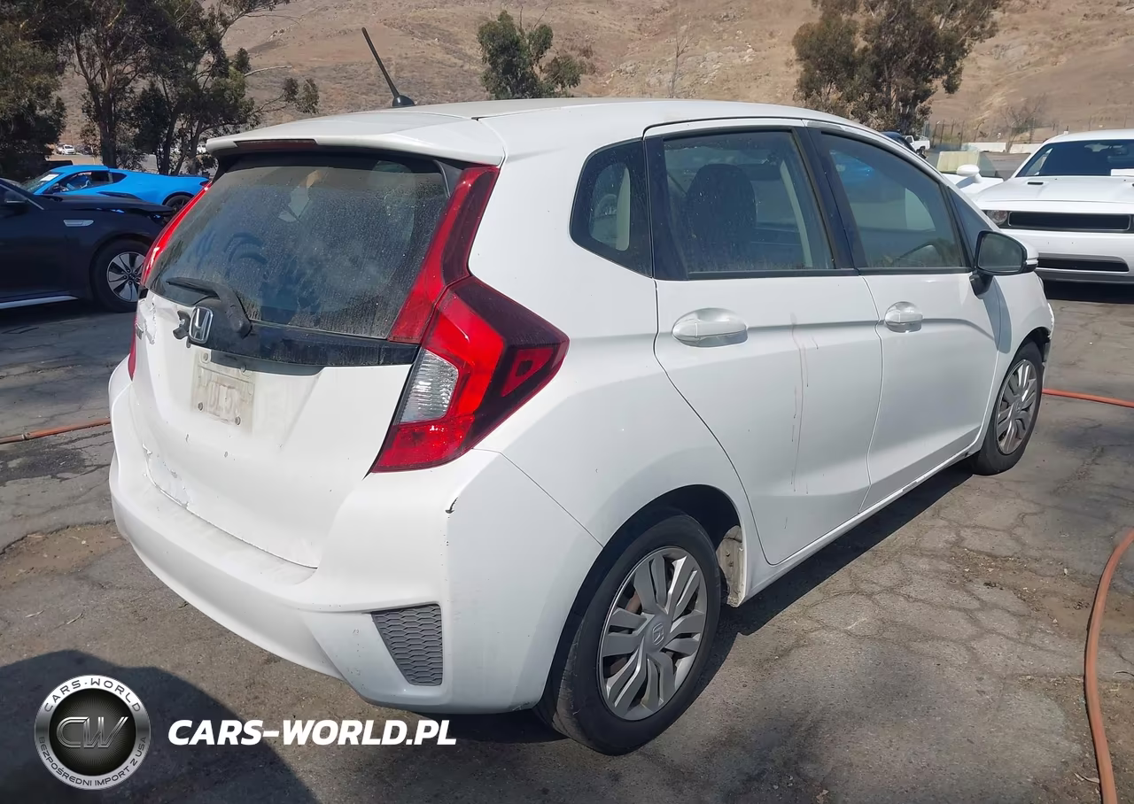 2015 Honda Fit Lx VIN:3HGGK5H52FM786588 - 4