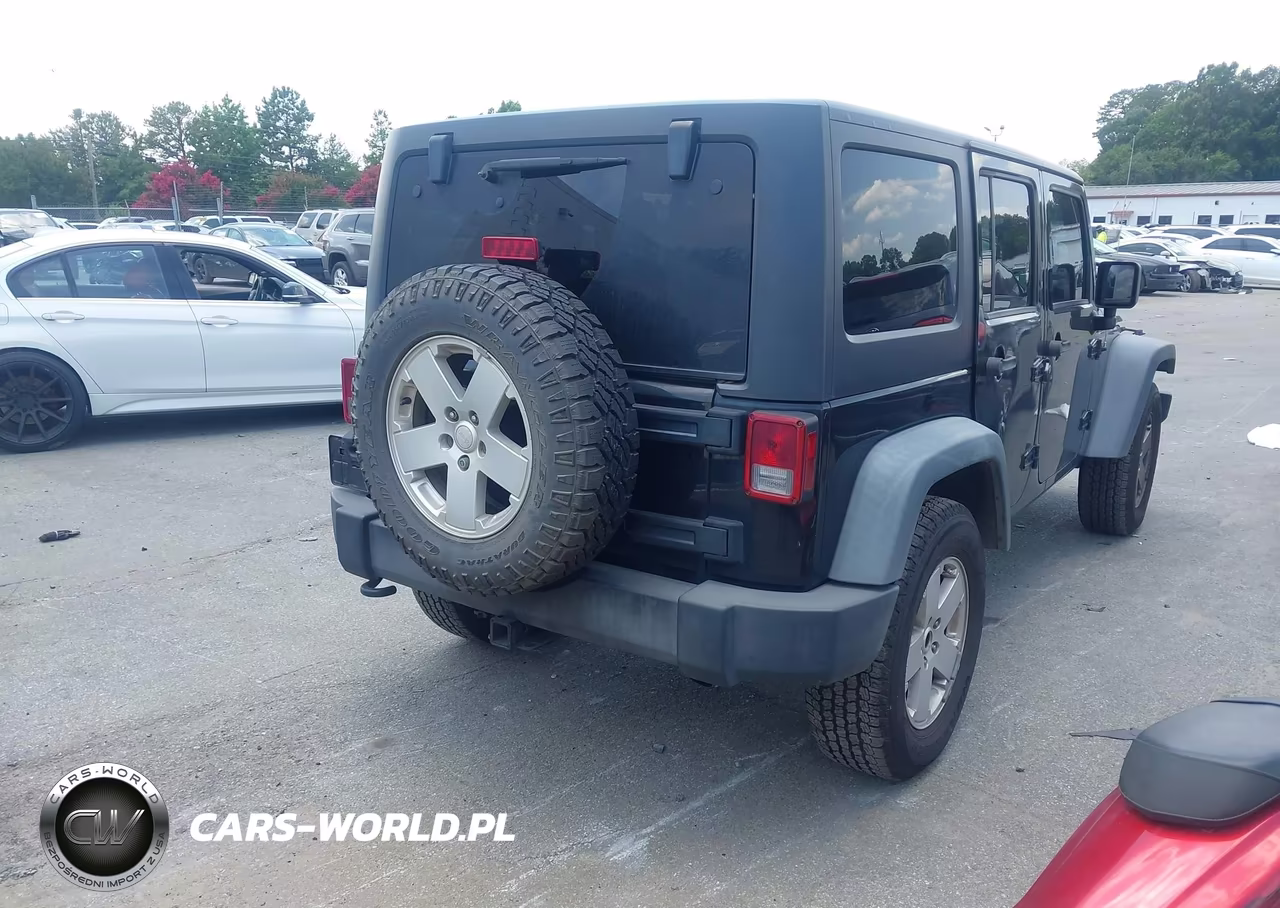 2012 Jeep Wrangler Unlimited Sport VIN:1C4BJWDGXCL201326 - 4