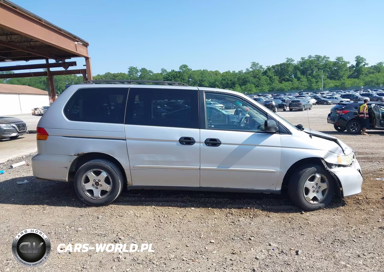 2002 Honda Odyssey Lx VIN:2HKRL18552H580999 - 13