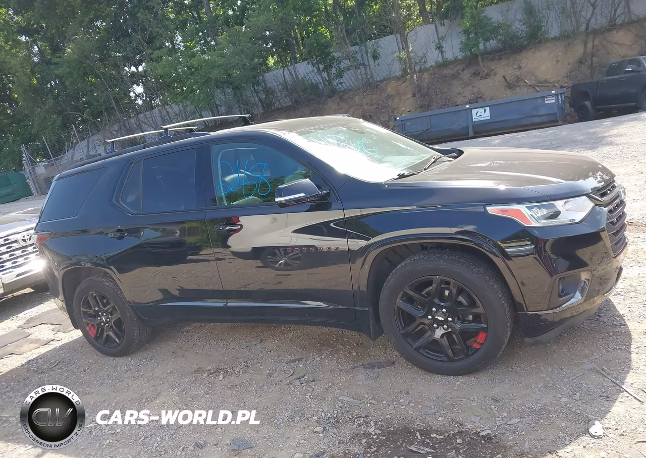 2018 Chevrolet Traverse Premier VIN:1GNEVJKW4JJ270124 - 13