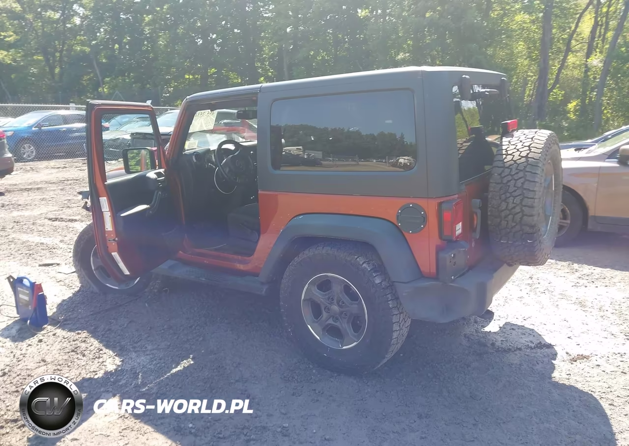 2014 Jeep Wrangler Sport VIN:1C4GJWAG3EL169140 - 3