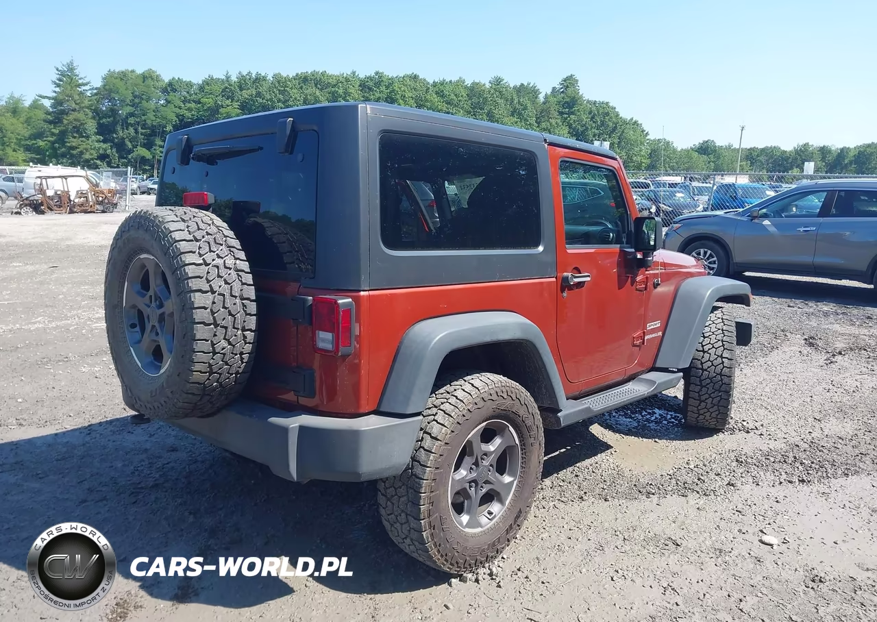 2014 Jeep Wrangler Sport VIN:1C4GJWAG3EL169140 - 4