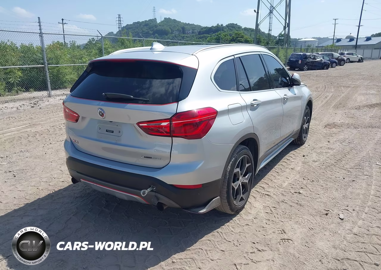 2018 BMW X1 xDrive28I VIN:WBXHT3C34J5L32919 - 4
