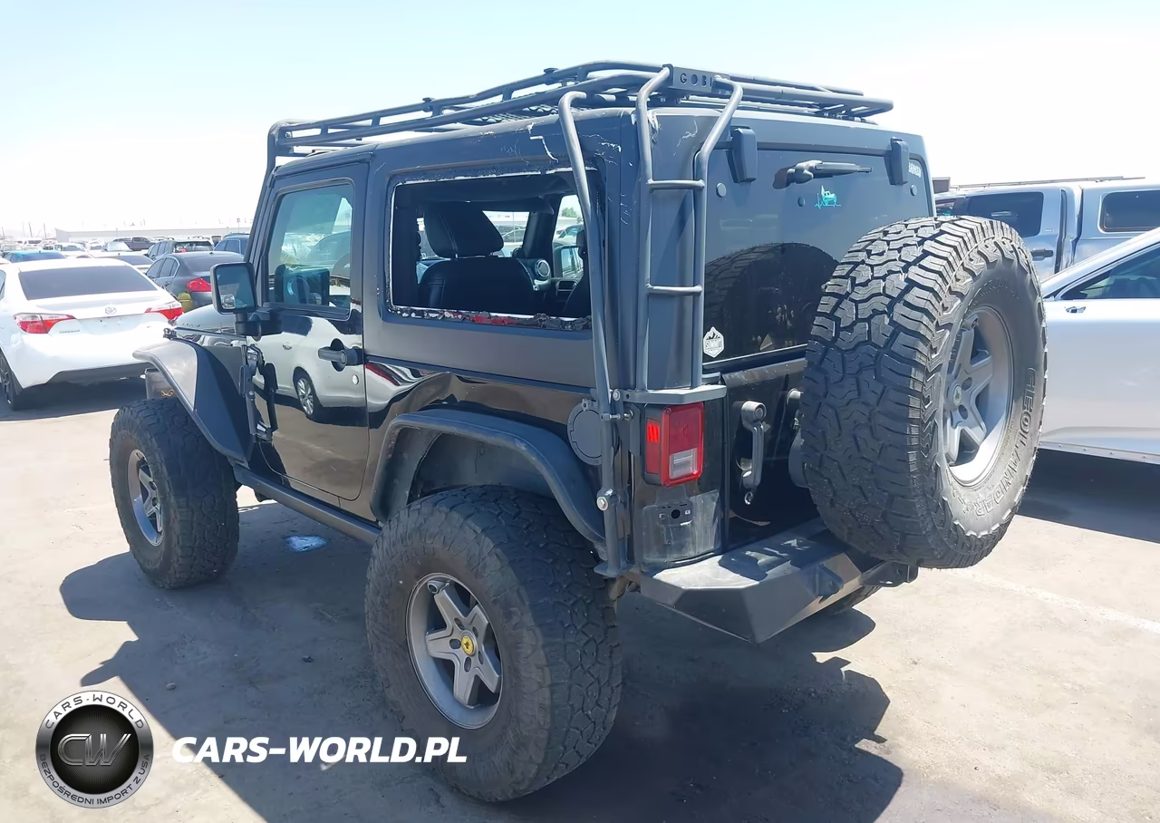2013 Jeep Wrangler Rubicon VIN:1C4HJWCG1DL672536 - 3