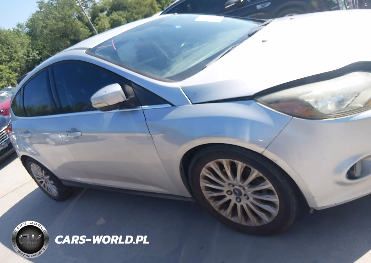 2012 Ford Focus Titanium VIN:1FAHP3N29CL342694 - 13