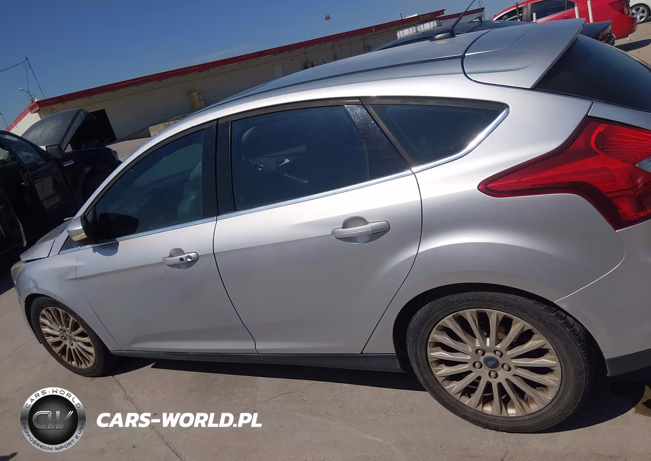 2012 Ford Focus Titanium VIN:1FAHP3N29CL342694 - 14