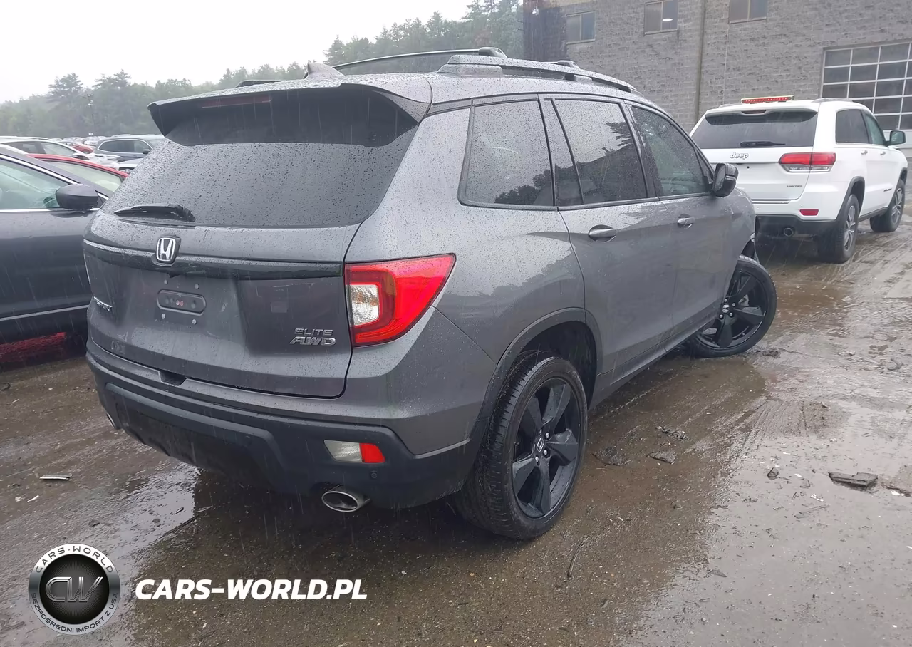 2019 Honda Passport Elite VIN:5FNYF8H02KB004642 - 4