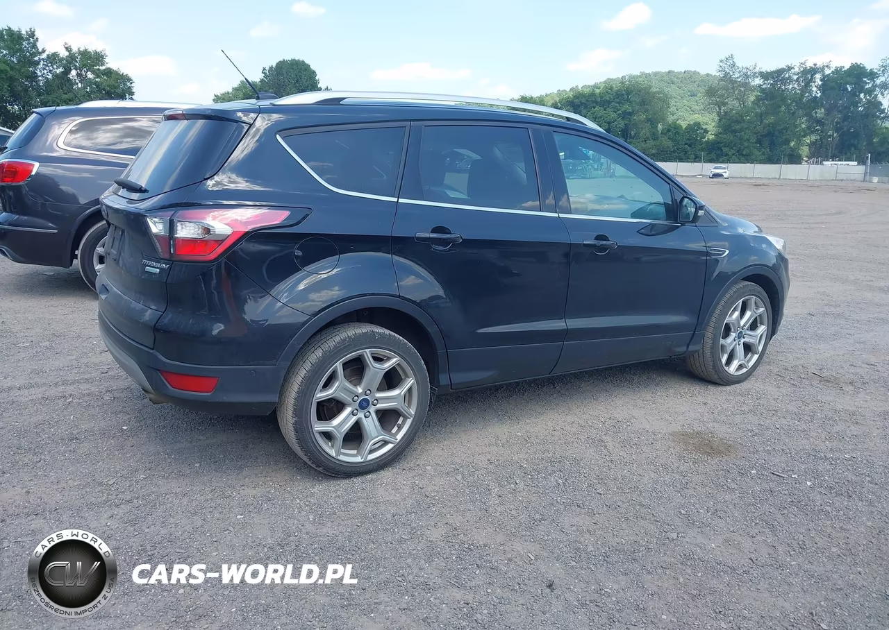 2017 Ford Escape Titanium VIN:1FMCU0JD0HUD92268 - 4