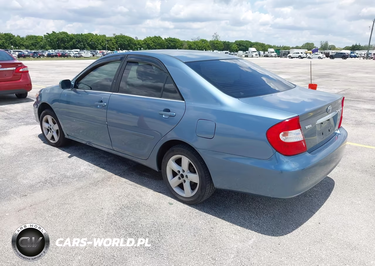 2002 Toyota Camry Le VIN:JTDBE32K220109797 - 3