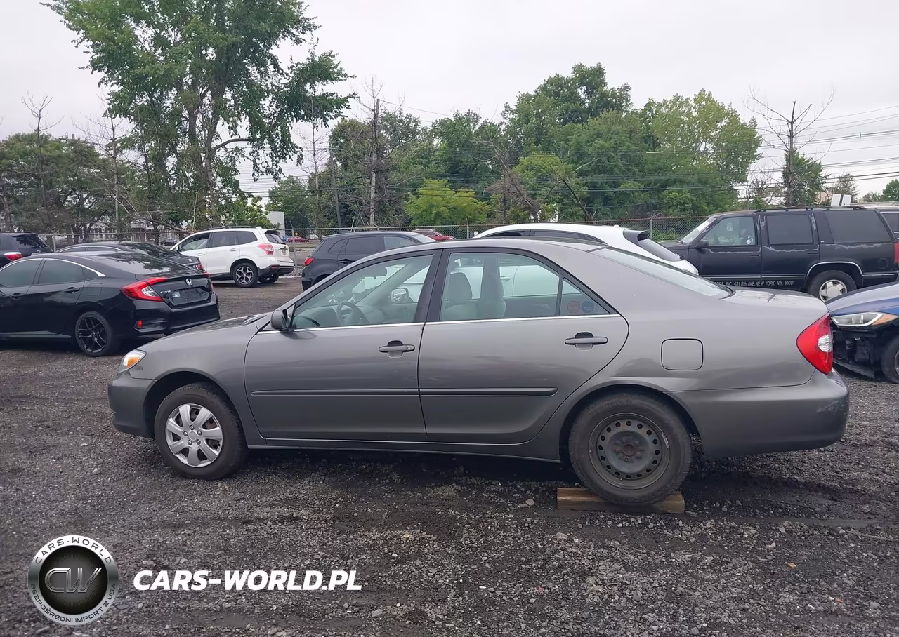 2003 Toyota Camry Le VIN:JTDBE32K630147650 - 14