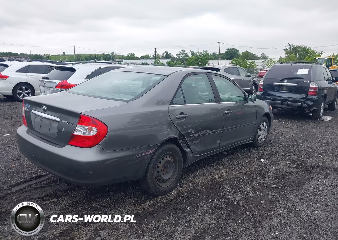 2003 Toyota Camry Le VIN:JTDBE32K630147650 - 4