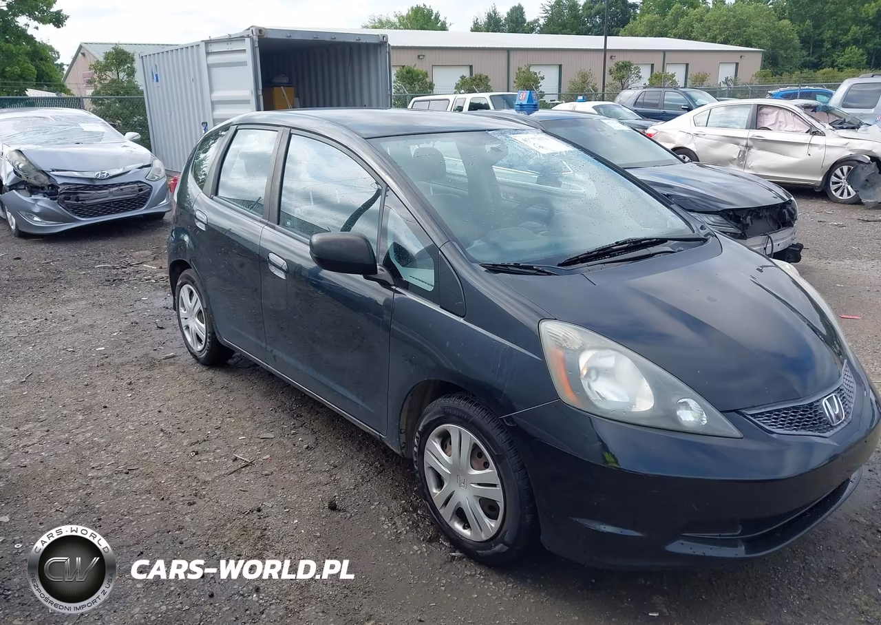 2010 Honda Fit VIN:JHMGE8H28AC005384 - 1